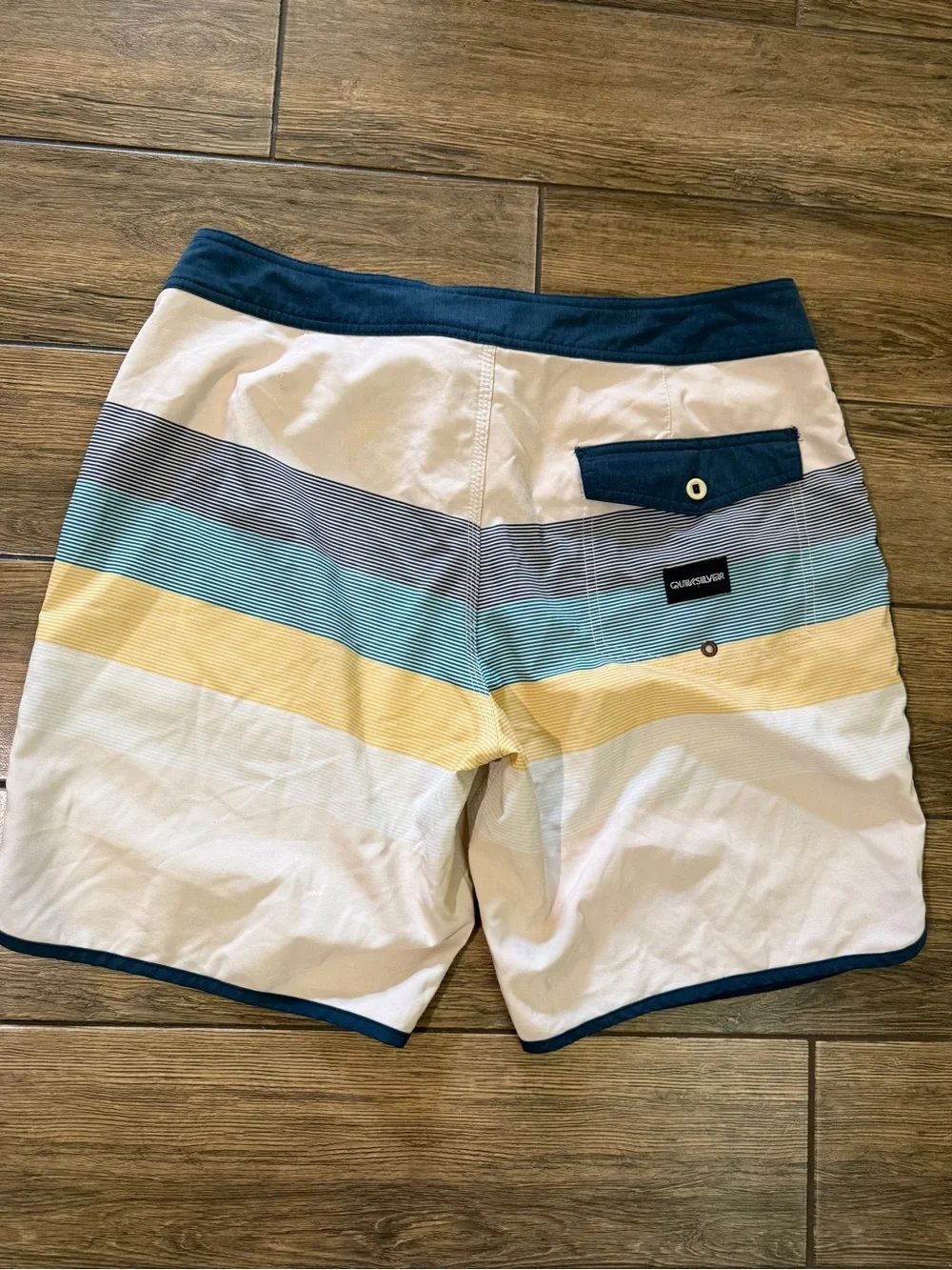 Quiksilver Men’s White Swim Shorts with Blue, Gray & Yellow Stripes